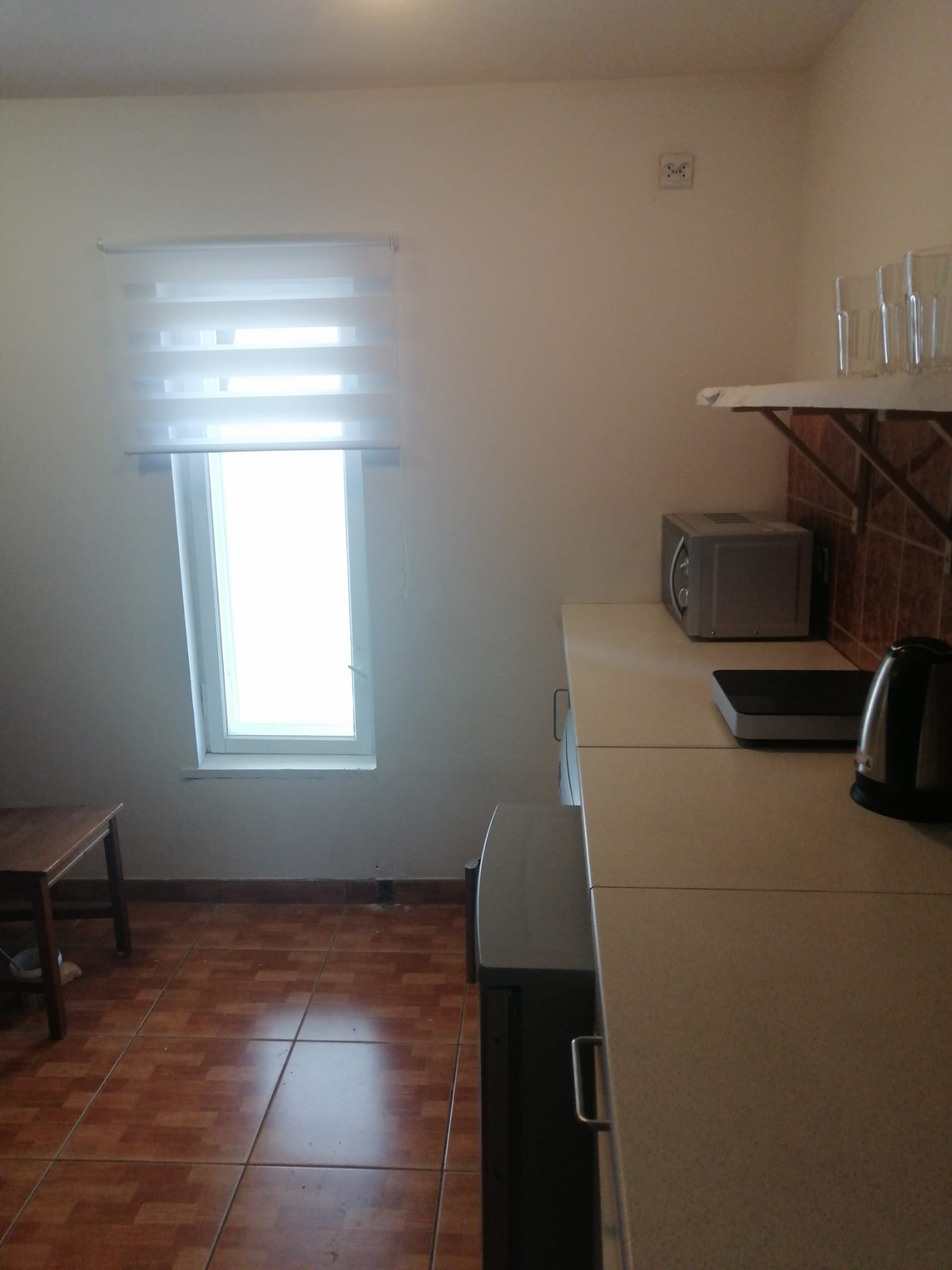 Kitchen area of apartment